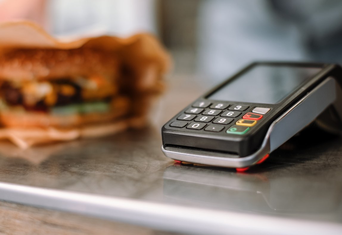 Credit card scanner on table